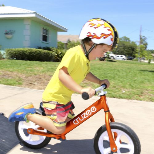 Cruzee Balance Bike Orange Action Melon Helmet